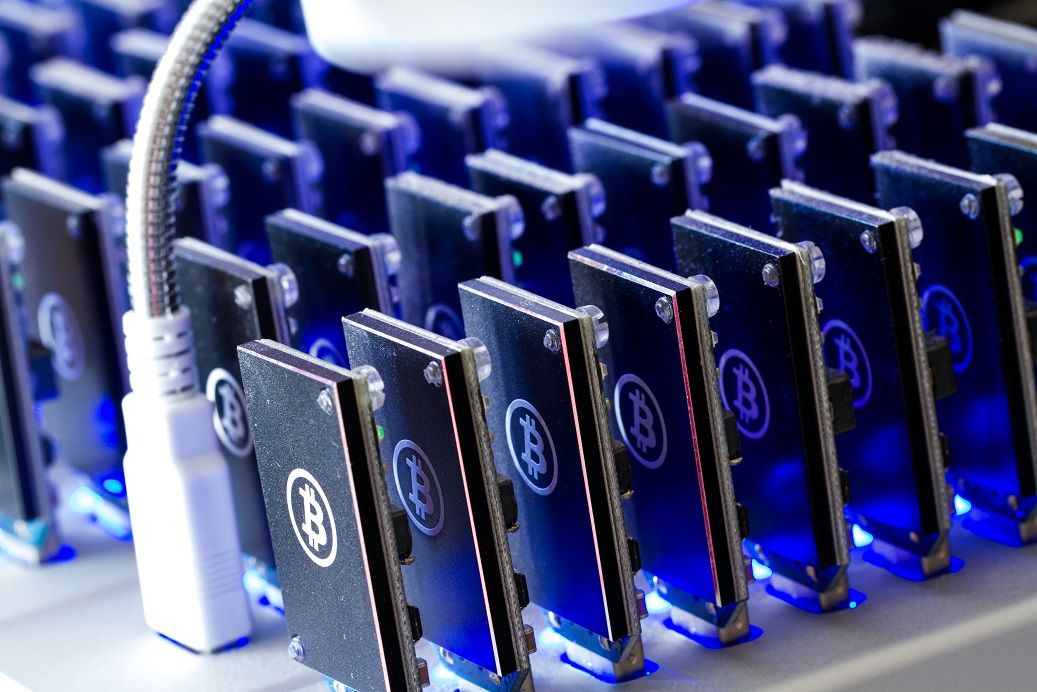 What is Bitcoin mining, and why is it necessary?