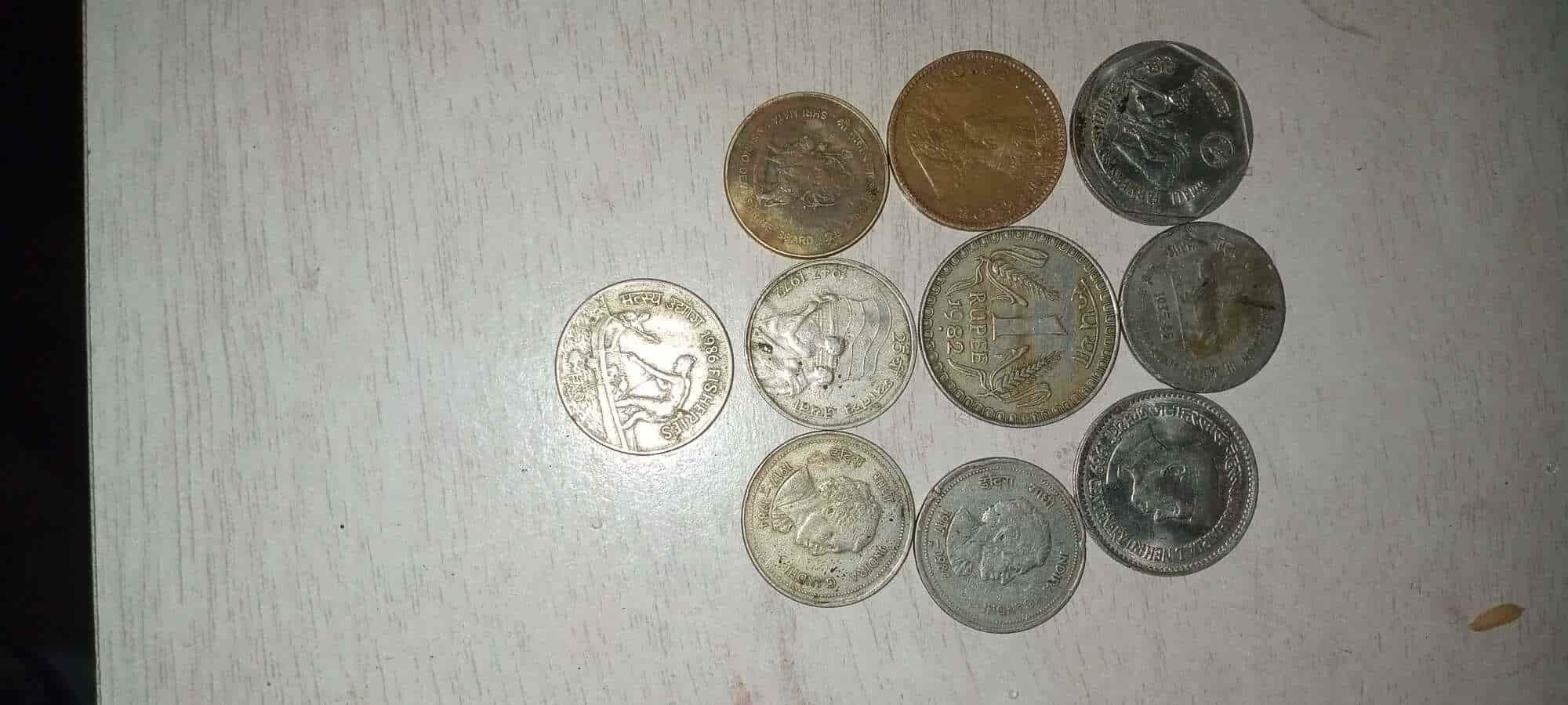 old coins - coin & Semi Husked Coconut from Visakhapatnam