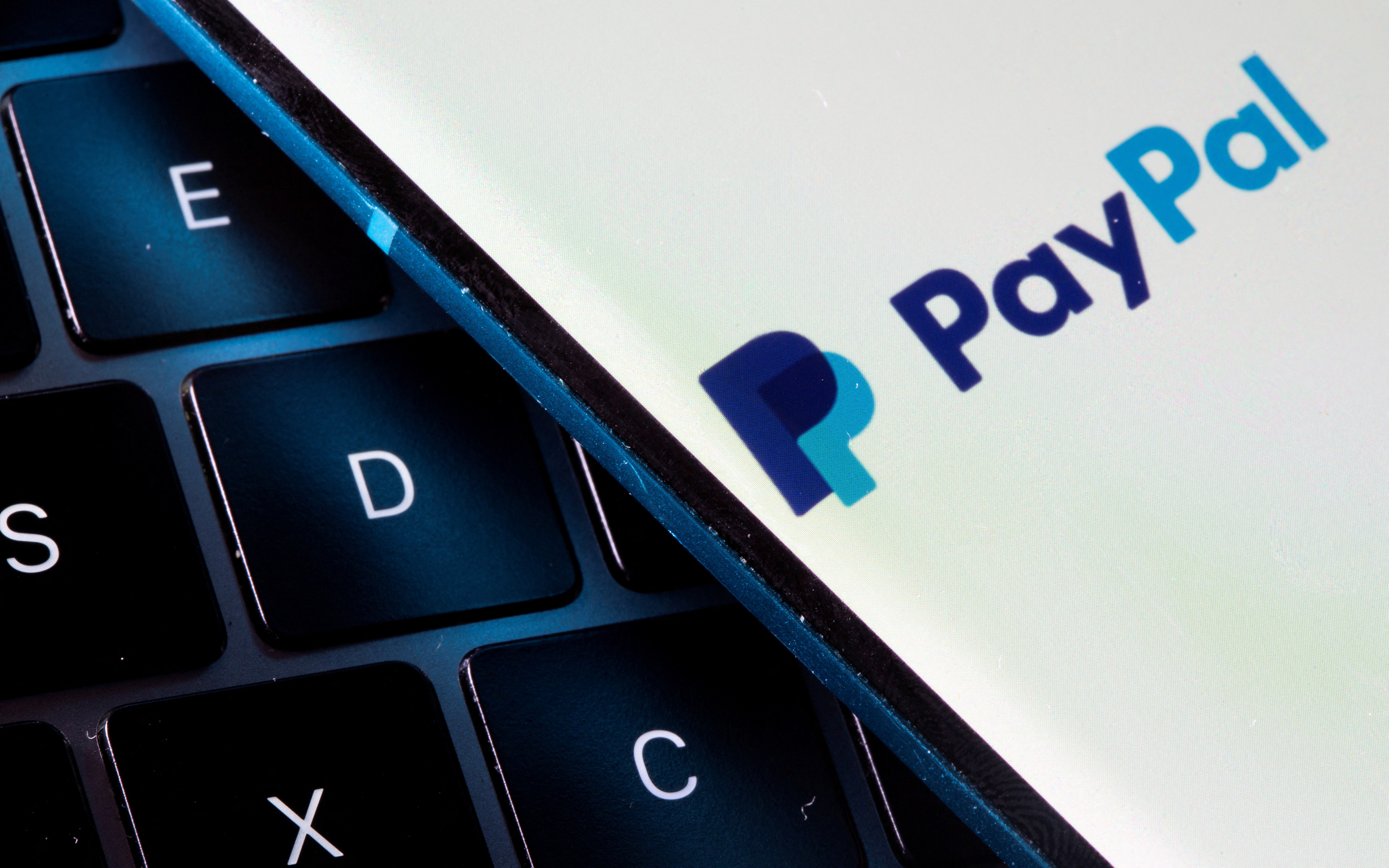 PayPal allows transfer of crypto to external wallets | Reuters