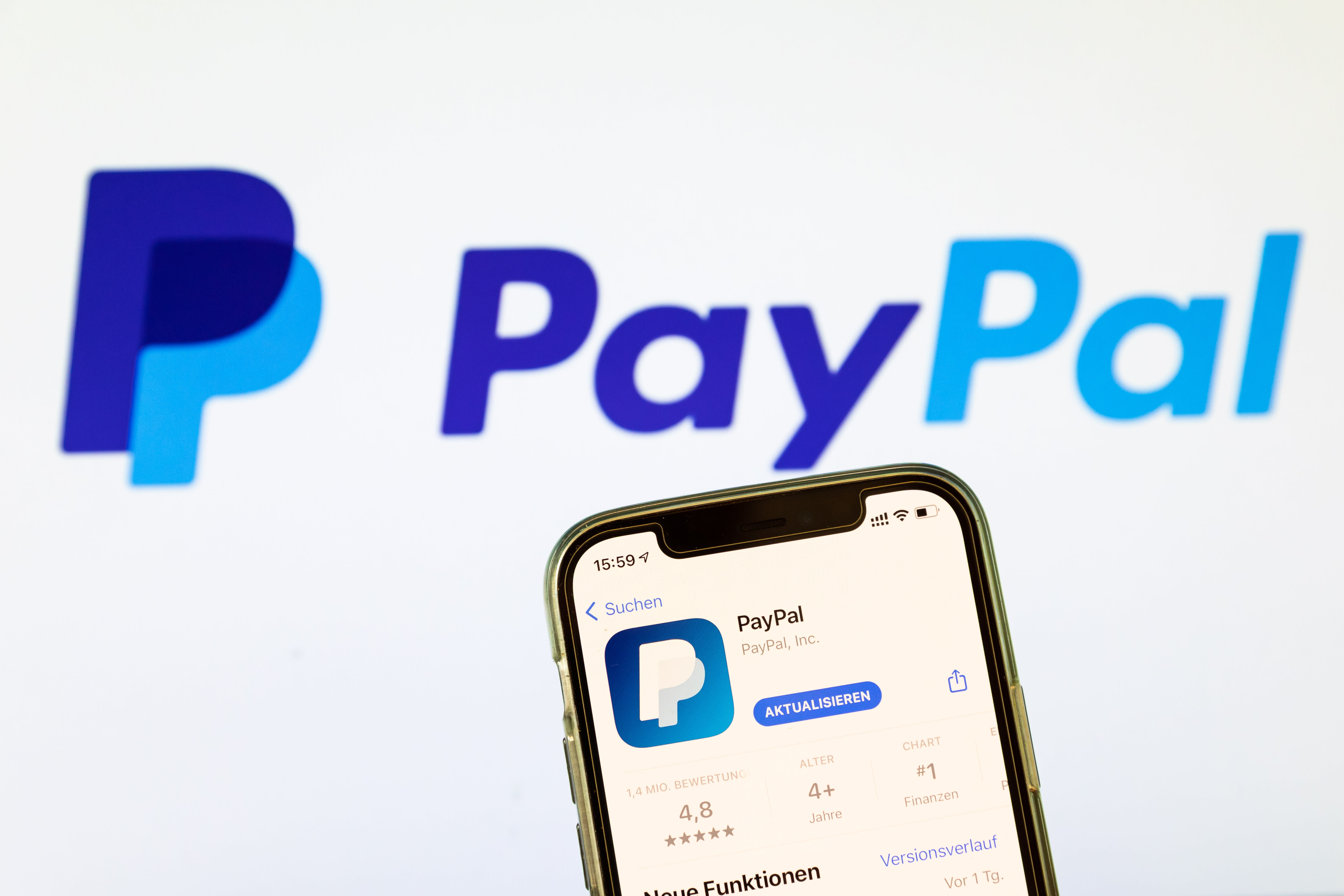 PayPal sees flat profit in 'transition year,' shares fall | Reuters