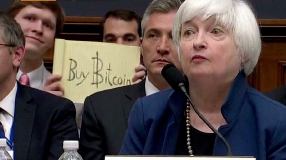 Video: Bitcoin Sign Guy Tells All About Infamous Janet Yellen Photobomb